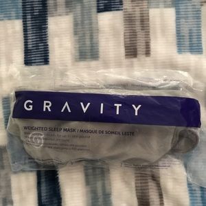 Gravity weighted sleep mask